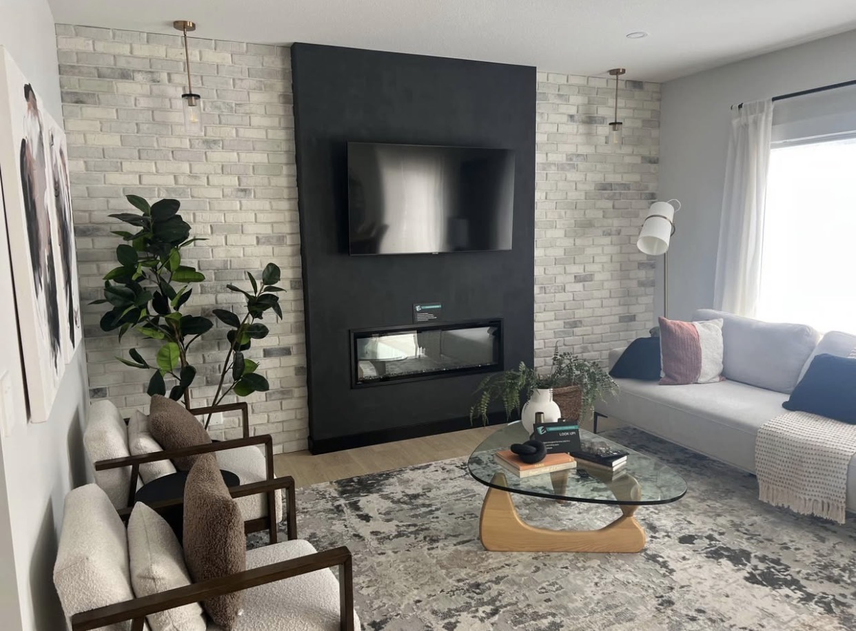Modern fireplace with brick veneer feature wall
